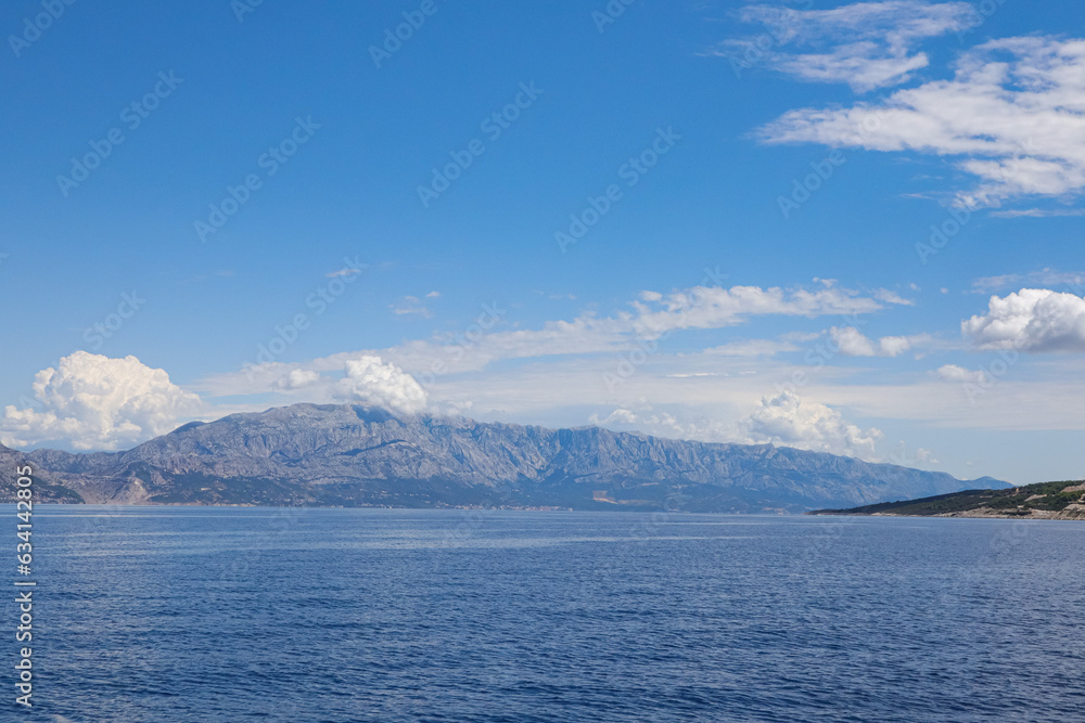 Croatia,photo of the blue Adriatic Sea with a view of the majestic mountains