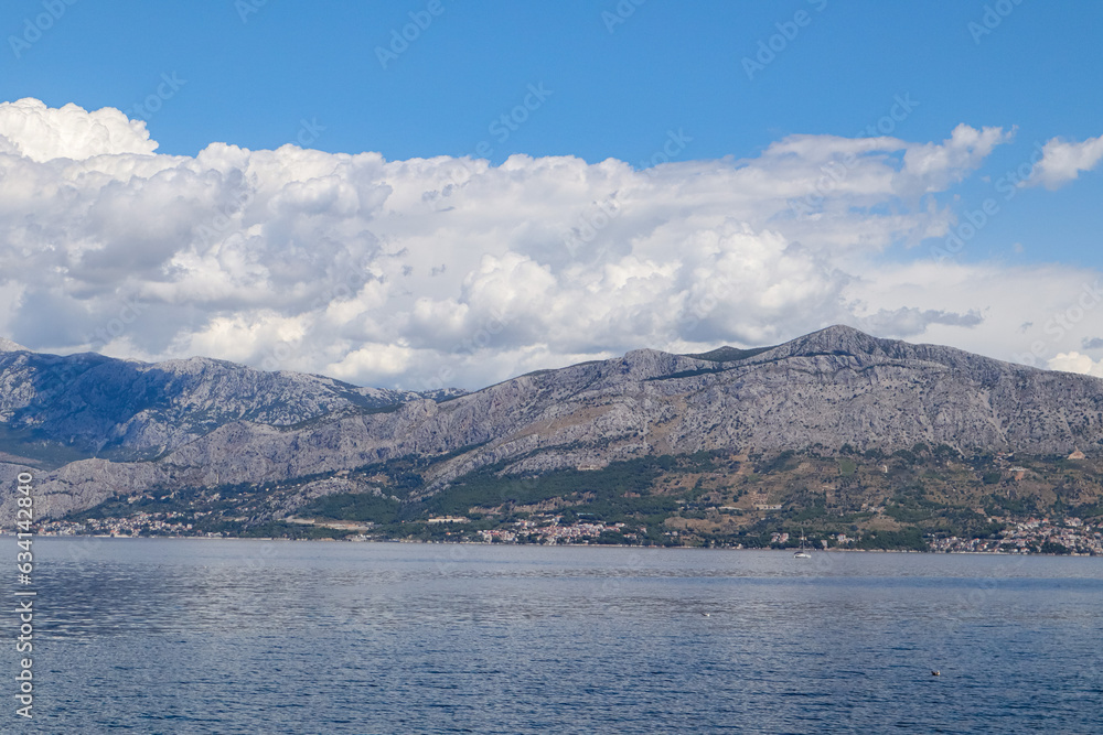 Croatia,photo of the blue Adriatic Sea with a view of the majestic mountains Croatia,photo of the blue Adriatic Sea with a view of the majestic mountains