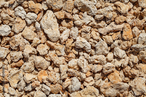 Stones small from sedimentary marine rocks close-up