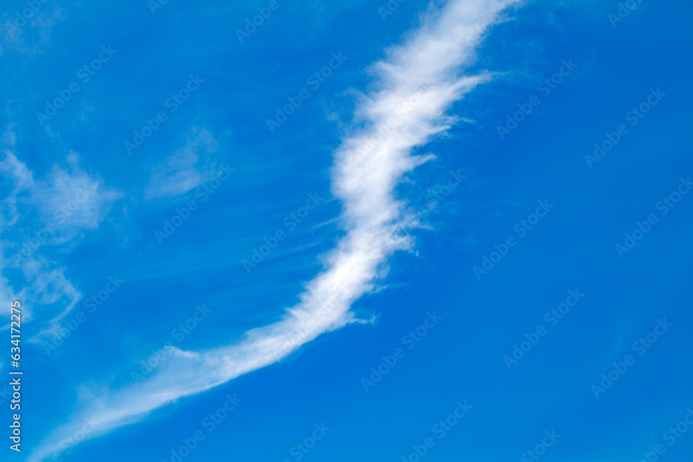 Feather clouds white in blue sky at day Feather clouds white in blue sky at day