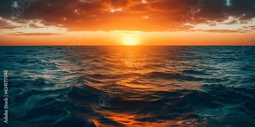 Beautiful sunset over the sea. Panoramic view of the sea at sunset.