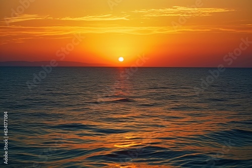 Beautiful sunset over the sea. Panoramic view of the sea at sunset.