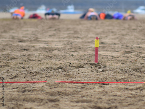 Flags event at surf lifesaving competition in Cornwall, UK