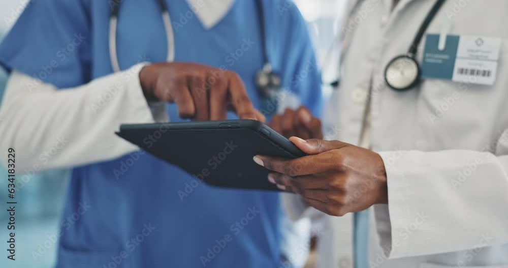 Planning, tablet and a doctor in discussion with a nurse in the hospital about healthcare diagnosis. Medical, teamwork or records with a medicine professional and assistant in a clinic for treatment Planning, tablet and a doctor in discussion with a nurse in the hospital about healthcare diagnosis. Medical, teamwork or records with a medicine professional and assistant in a clinic for treatment