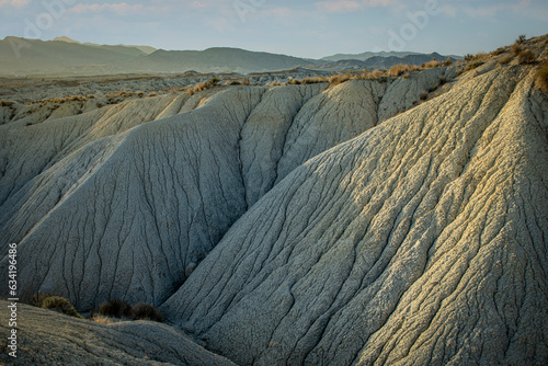 Detail of the gullies that form the ramblas of the arid and desert landscape of badlands of the Abanilla desert, Murcia, Spain, photo