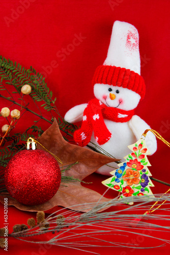 Christmas decoration with snowman and red background