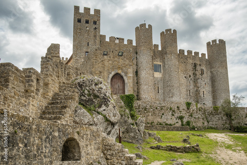 Fotografija Castle of Obidos, a medieval fortified village at cloudy day in Portugal