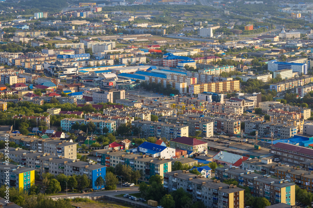 Morning cityscape. Top view of the buildings and streets of the city. Residential urban areas at sunrise. Beautiful aerial city landscape. Petropavlovsk-Kamchatsky, Kamchatka Krai, Far East of Russia.