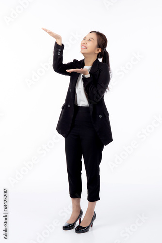 Portrait young asian business woman presenting with surprise and excited isolated white background, advertising and marketing, executive and manager, businesswoman showing something with satisfied.