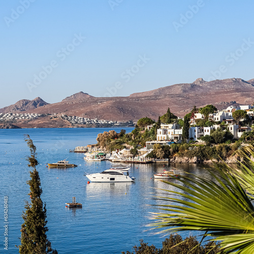 Fototapeta Naklejka Na Ścianę i Meble -  Blue sea, islands and boats on the Aegean coast. Summer vacation and coastal nature concept