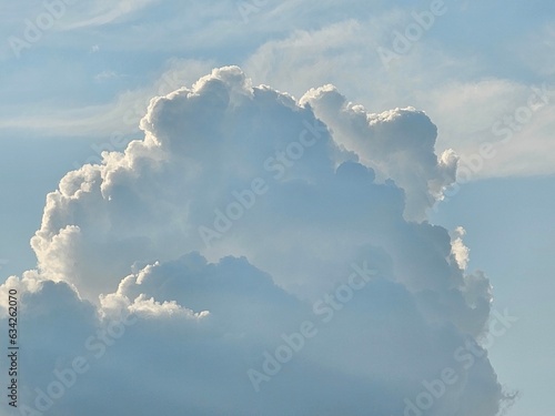 Blue sky with puffy clouds