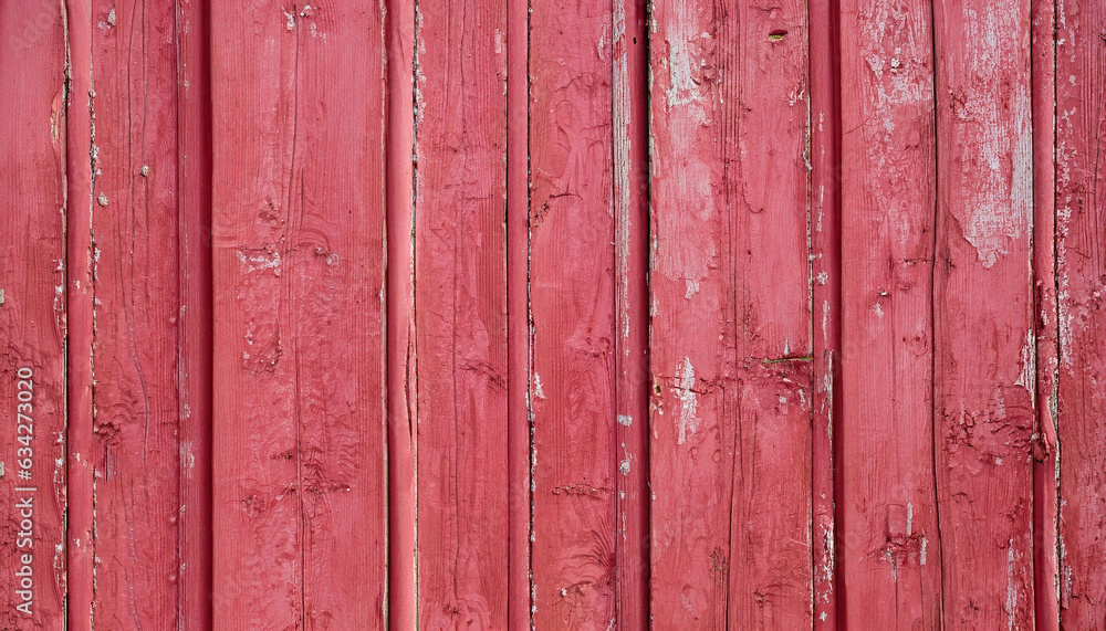 Texture of old battered red vertical boards. Background of pink peeling painted wooden wall. Grunge wallpaper copyspace. Texture of old battered red vertical boards. Background of pink peeling painted wooden wall. Grunge wallpaper copyspace.
