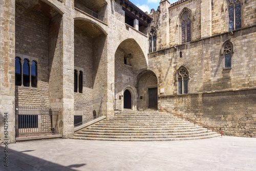 Barcelona, Spain-July 30, 2023. Plaza del Rey, Plaça del Rei, Gothic Quarter of Barcelona, Spain. Monumental square, surrounded Gothic and Renaissance buildings, El Tinell, the chapel of Santa Agata