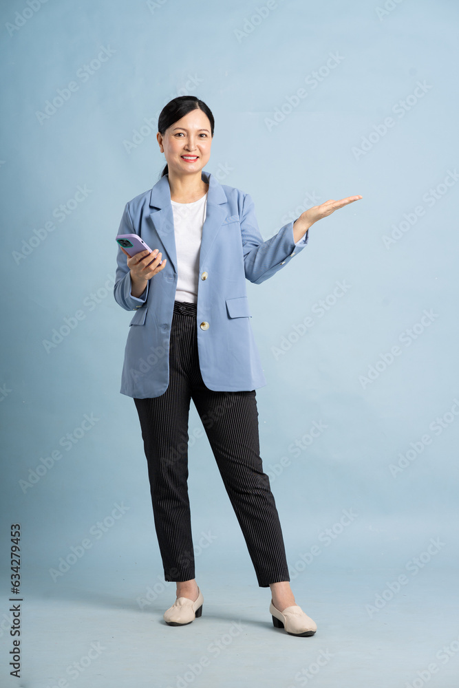 full body photo of a middle-aged businesswoman full body photo of a middle-aged businesswoman