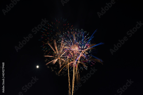 Fire works with Moon in Japan