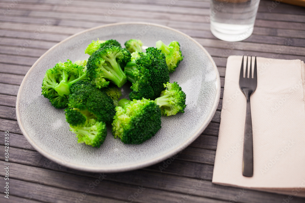 healthy food. steamed broccoli inflorescences in a bowl