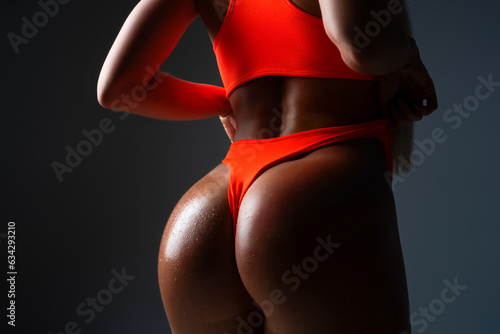 Fotografija Sexy female ass in black panties