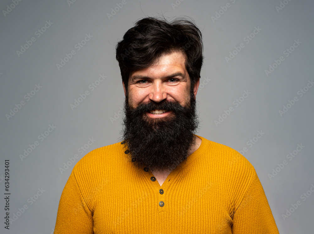 Fototapeta premium Happy man smile face. Handsome smiling bearded guy. Positive human facial expression emotion concept.
