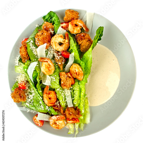 Japanese Caesar salad with shrimps on a white background