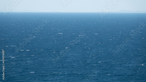 Sea front and skyline of the North Aegean Sea on a windy day, close up view of sea surface