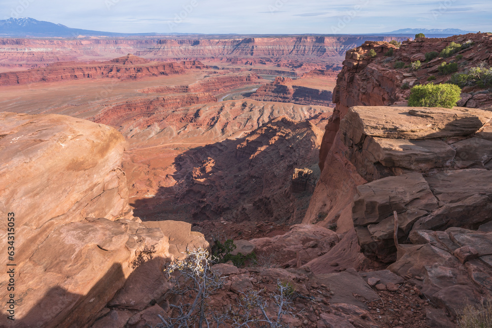 hiking the dead horse trail in dead horse point state park in utah, usa hiking the dead horse trail in dead horse point state park in utah, usa