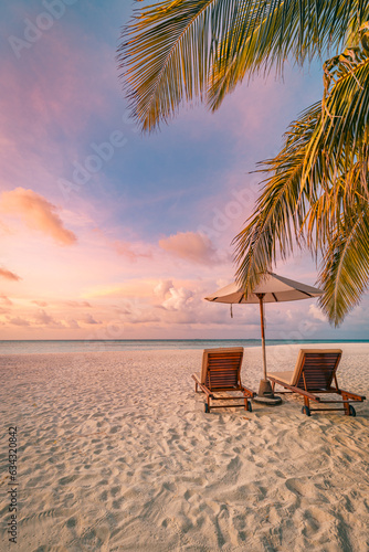 Tropical sunset beach panorama as summer relax landscape. Swing on coconut palm tree hanging over sandy coast calm sea, carefree beach. Amazing panoramic summer vacation. Sun rays seascape relax sky © icemanphotos
