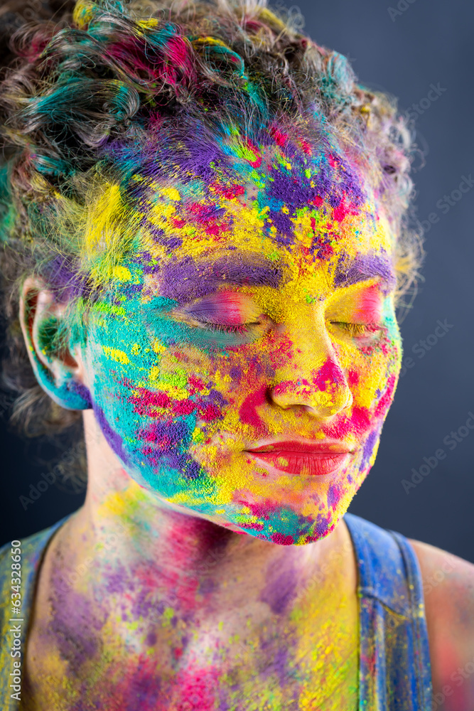 Bodypainting, creative makeup, bright colorful body art on gray background, plus size fat woman painted with powder paints