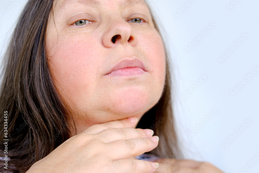 close up part face mature woman 55 years old, human fat neck, side view, double saggy chin, Beauty Standards and Aesthetics, age-related skin changes, cosmetic anti-aging procedures, skin tightening close up part face mature woman 55 years old, human fat neck, side view, double saggy chin, Beauty Standards and Aesthetics, age-related skin changes, cosmetic anti-aging procedures, skin tightening