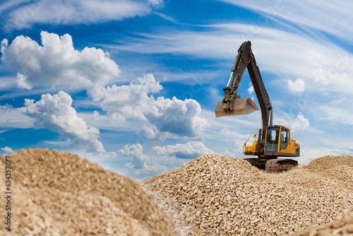 Excavator on mountains. Con...