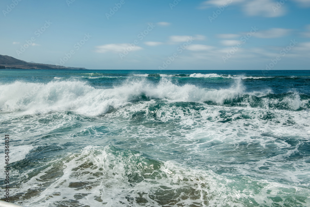 rough sea with a strong surge of white foam 