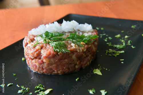 delicious red tuna tartare with onion and parsley 