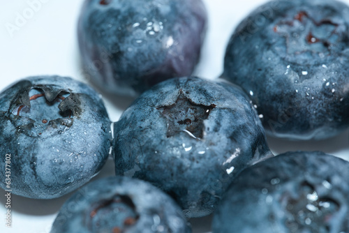 close up of blueberries with water splashes