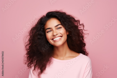 Smiling Mexican Woman with Vibrant Pink Background