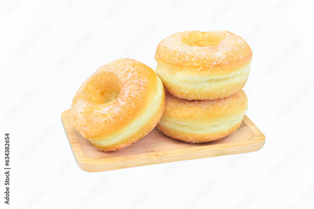 sugar coated donut in square wood tray on white background closeup,isolated sugar coated donut in square wood tray on white background closeup,isolated