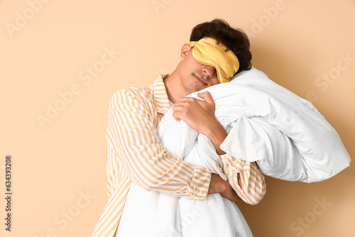 Young man in striped pajama...