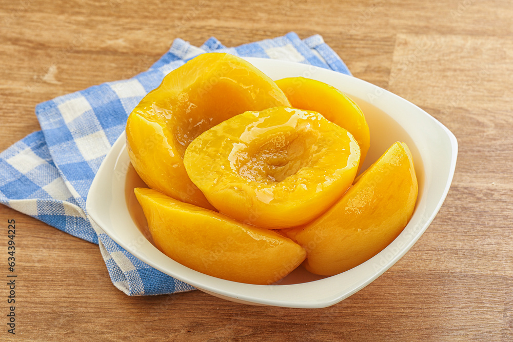 Sweet canned peaches with syrope Sweet canned peaches with syrope