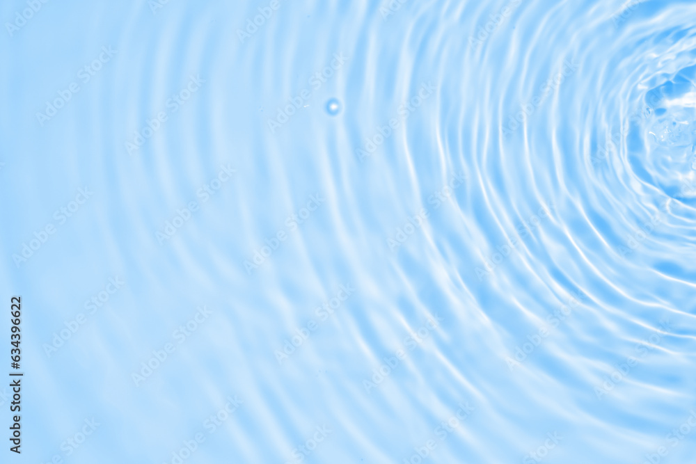 Abstract transparent water shadow surface texture natural ripple on blue background