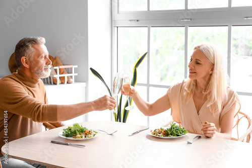 Mature couple having dinner...