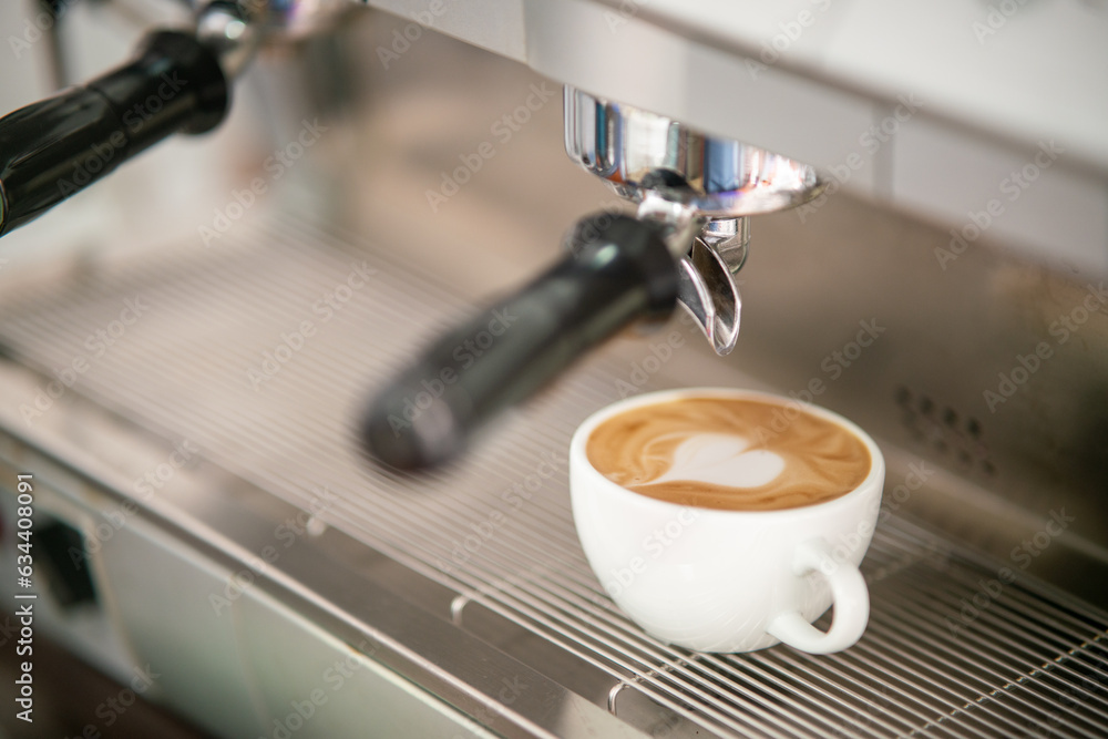 cup of coffee under the coffee machine cup of coffee under the coffee machine