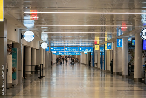 renovated new airport concourse hallway and bathrooms and shops photo
