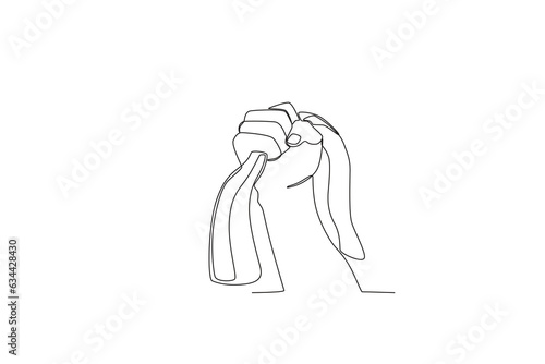 A hand holding firmly the Indonesian flag. Youth pledge one-line drawing