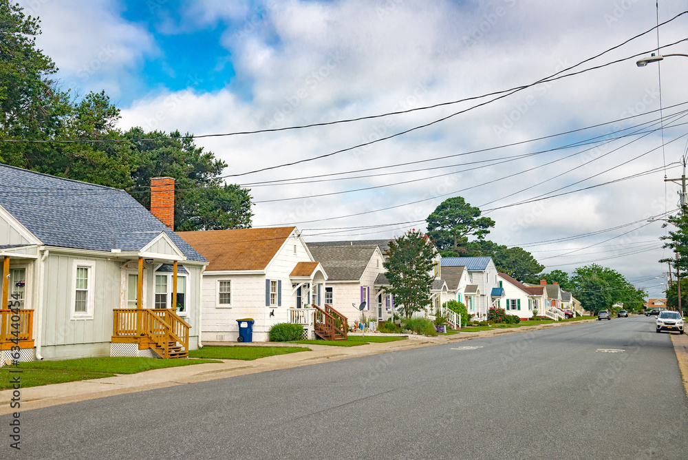 streets of the resort town of Asoteague in Virginia. Small wooden houses with colorful roofs. streets of the resort town of Asoteague in Virginia. Small wooden houses with colorful roofs.