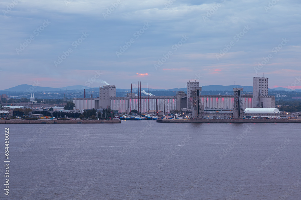 The port skyline seen from the south shore during a cloudy summer dusk, Quebec City, Quebec, Canada