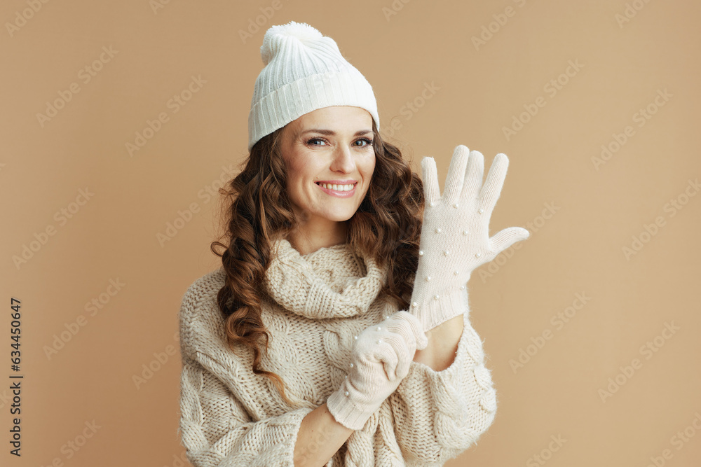 happy trendy woman isolated on beige background happy trendy woman isolated on beige background