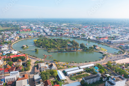 Aerial view of residential neighborhood roofs. Urban housing development from above. Top view. Real estate in Roi et province city, Thailand. Property real estate. photo