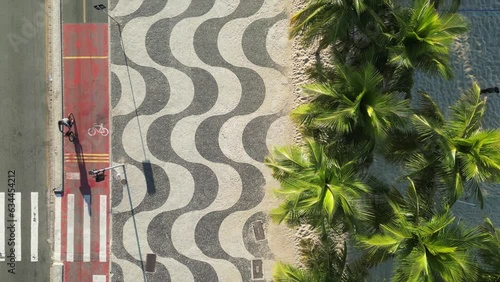 Top View of Copacabana Mosaic Sidewalk and Palm Trees at the Beach in Rio de Janeiro, Brazil