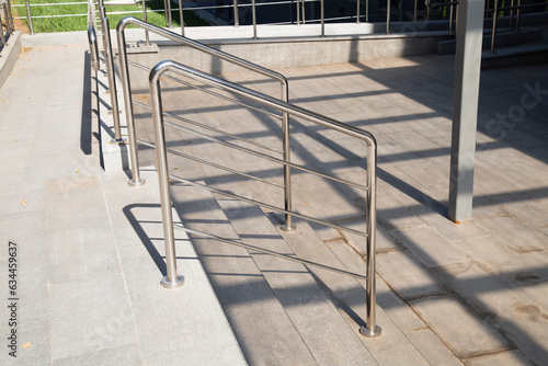 Stainless steel railings on city streets.Pedestrian crossings in the city.
