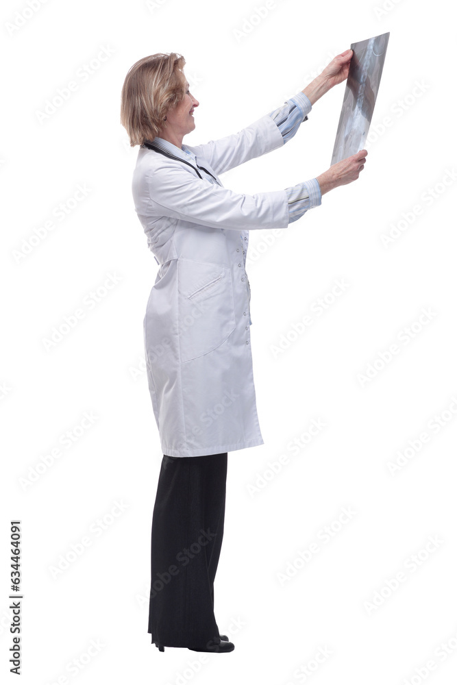Side view of mature female doctor holding X-ray Side view of mature female doctor holding X-ray