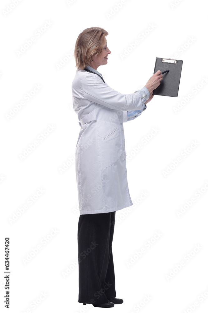 Female doctor smiling and showing a clipboard with an empty document Female doctor smiling and showing a clipboard with an empty document