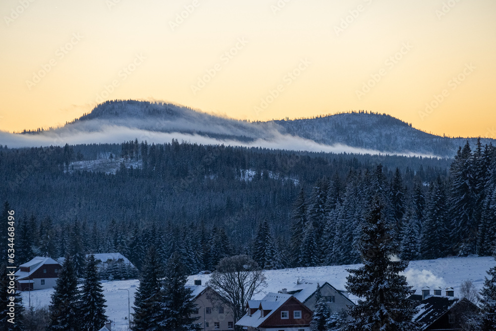 Mountains Roklany under the snow and in clouds, Sumava national park Mountains Roklany under the snow and in clouds, Sumava national park